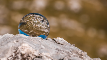 Crystal ball alpine landscape shot at the Loser summit-Altaussee-Steiermark-Austria