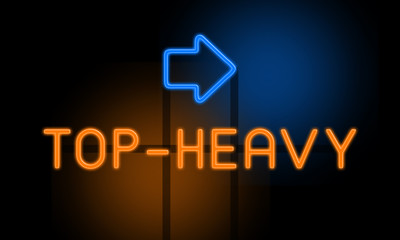 Top-heavy - orange glowing text with an arrow on dark background