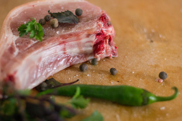 raw meat.herb and green papper on white background