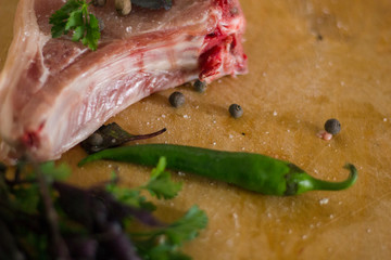 raw meat.herb and green papper on white background