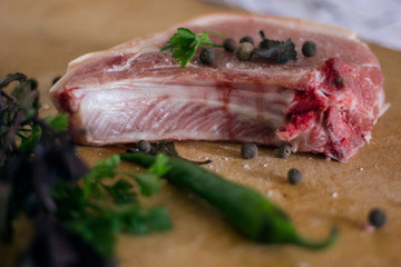 raw meat.herb and green papper on white background