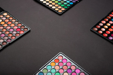 Make-up colorful eyeshadow palettes as a make-up background