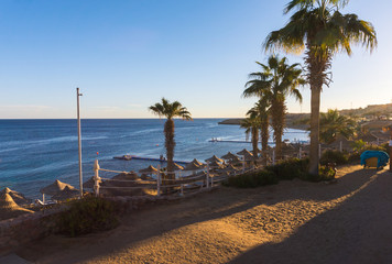 Sunset over the resort area of the Red Sea coast in Egypt. Holiday in Sharm El Sheikh