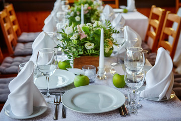 Decorated table for a festive or wedding event, decorated in apple style