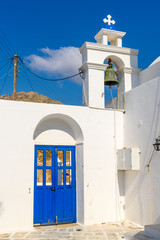 Serifos island with lovely whitewashed church and blue doors. Cyclades, Greece © vivoo