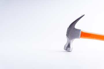 Hammer closeup on white background with selective focus and crop fragment