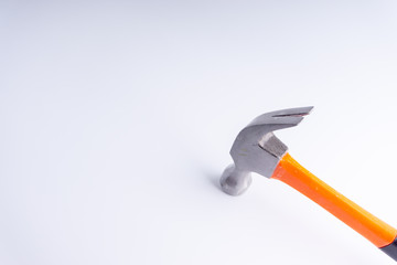 Hammer closeup on white background with selective focus and crop fragment