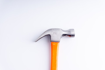 Hammer closeup on white background with selective focus and crop fragment