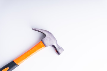 Hammer closeup on white background with selective focus and crop fragment