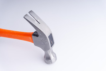 Hammer closeup on white background with selective focus and crop fragment