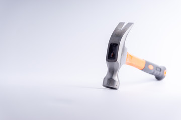 Hammer closeup on white background with selective focus and crop fragment