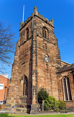 Clock tower of the parish church of St Luke and St Thomas Huntington in Cannock, UK