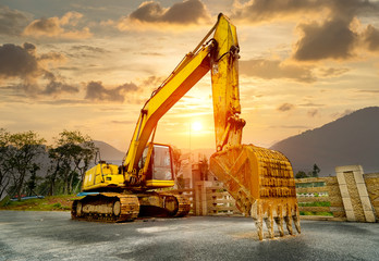 Heavy earth mover with blue sky in the background