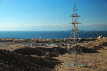 Power transmission tower near Tala Bay resort near Aqaba city, Jordan