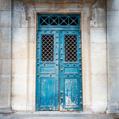 Old ancient front door to house with porch