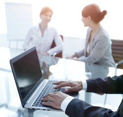 Fototapeta premium closeup of businessman typing on laptop.