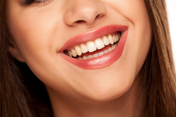 Fototapeta premium Smiling woman with natural and healthy teeth