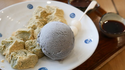 Close up shot of a Japanese dessert (Kinako Warabi Mochi)