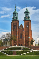 Towers of the gothic cathedral during autumn in Gniezno.