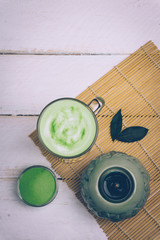 Vegan coconut matcha latte. Powdered green tea latte