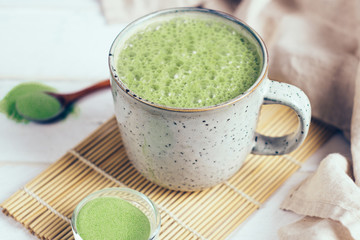 Vegan coconut matcha latte. Powdered green tea latte
