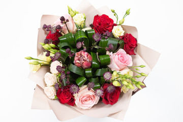 A bright bouquet of roses and greenery