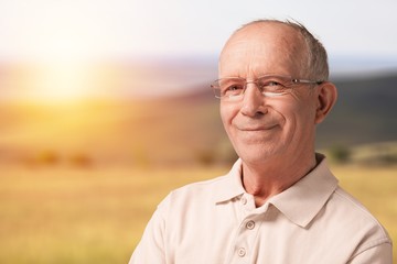 Portrait of senior man smiling at camera