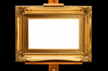 Elegant Rococo Frame on a stand. Blank copy space. Black Background.