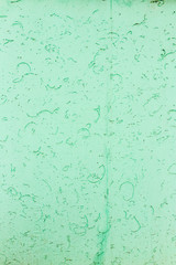 Green decorative plaster on the wall as a background