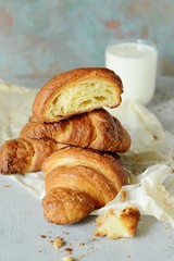 French fresh crispy croissant for breakfast, selective focus, copy space