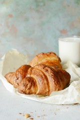 French fresh crispy croissant for breakfast, selective focus, copy space