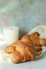 French fresh crispy croissant for breakfast, selective focus, copy space