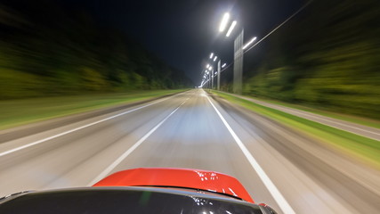 Drivelapse from top Side of Car moving on a night highway timelapse hyperlapse