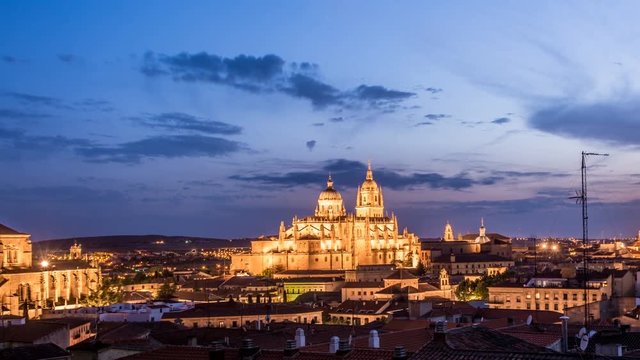 Night view of Salamanca cityscape, with the Cathedral, the Pontifical University and Dominican monastery of San Esteban fully illuminated. The Old city of Salamanca is declared by UNESCO a World
