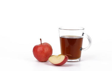 Apple and tea, cup of tea and delicious red apple isolated on white background - healthy diet