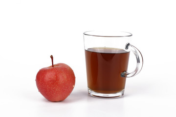 Apple and tea, cup of tea and delicious red apple isolated on white background - healthy diet