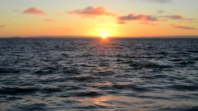 Sunset at the pacific ocean, southern california with small waves