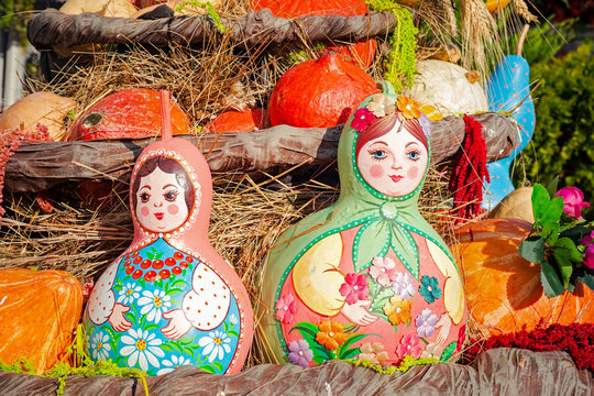Autumn  composition with pumpkinspkin in various shapes, flowers and plants  on Manege square in Moscow, Russia. Harvest holiday, farm market.  Autumn farm decorations, Background for halloween.  
