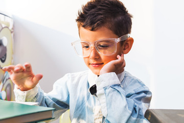 boy and books. learning concept