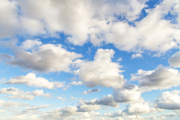 Naklejka na ściany i meble Blue sky with white cumulus fluffy clouds background 
