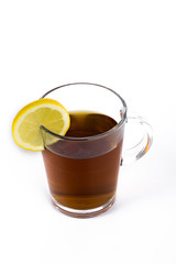 Lemon tea, cup with lemon tea and fresh lemon isolated on white background