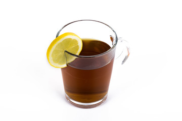 Lemon tea, cup with lemon tea and fresh lemon isolated on white background