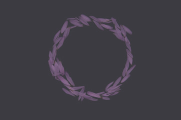 A circle of purple flower petals on a black intelligent background