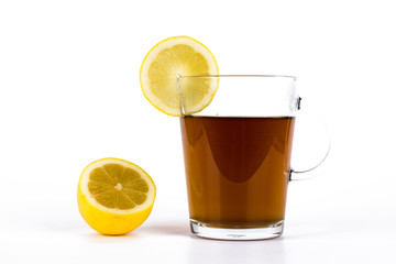 Lemon tea, cup with lemon tea and fresh lemon isolated on white background