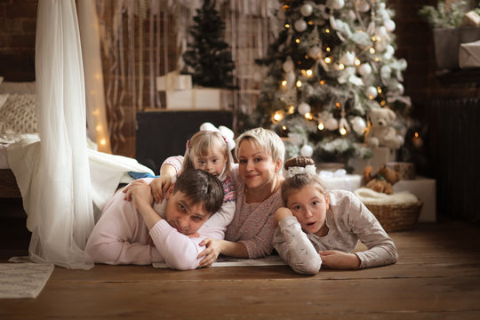 happy family at Christmas tree,down syndrome