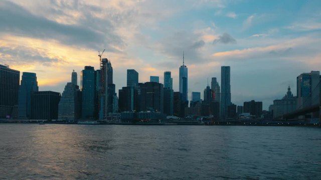 FIXED EST SUNSET View of New York City Manhattan downtown skyline. 4K UHD