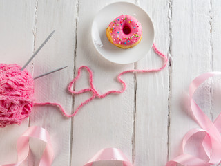 Donut on a white plate, copy space