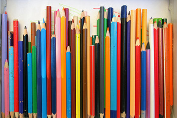 Arranged colored pencils close up