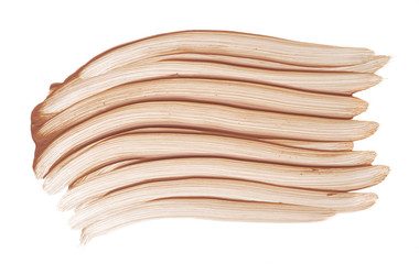 Light beige makeup smear of creamy foundation