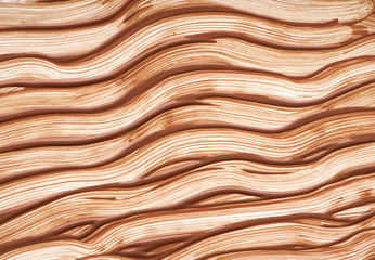 Light beige makeup smear of creamy foundation